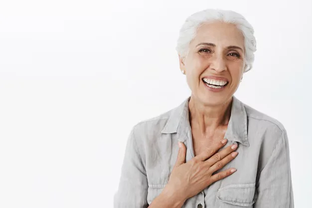 Older person smiling in a supportive care setting